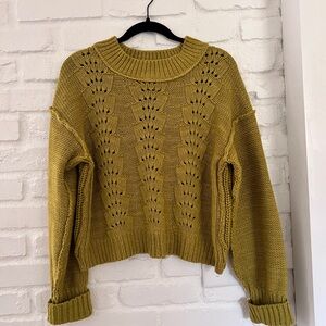 Free People Green Crew Neck Sweater with Ribbed Cuffs and Open-Knit Design